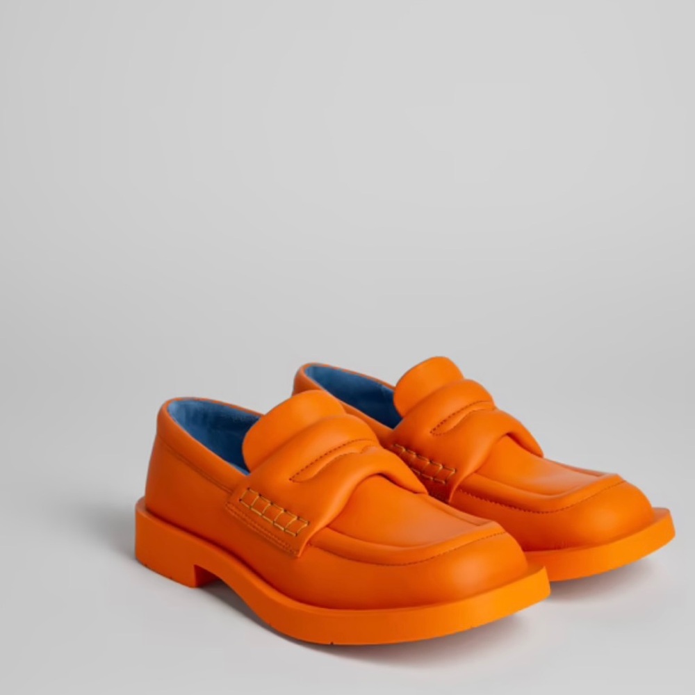 Campers Orange leather padded loafers with rubber outsoles. Unisex
